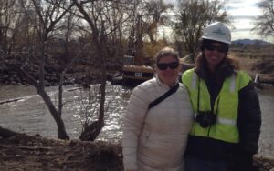 Amy Beatie and Tara Schutter pause to pose for a picture during the excitement on demolition day | Karen Wogsland