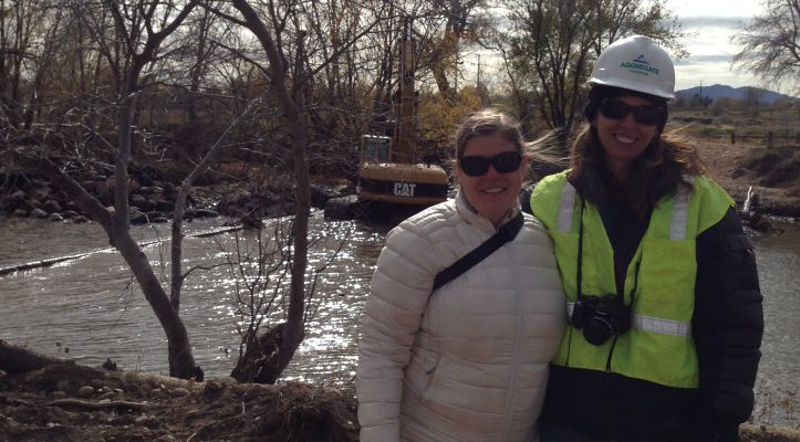 Amy Beatie and Tara Schutter pause to pose for a picture during the excitement on demolition day